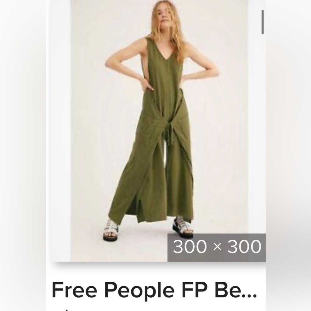 Free People Beach-NWOT wide leg wrap romper. Never worn. Xs-but Oversized.